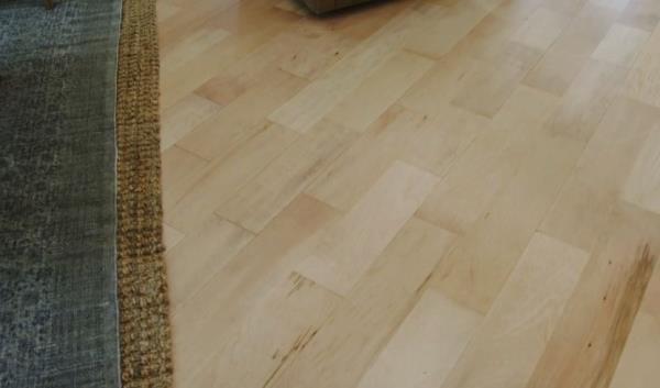 You'd never know this was a patched and re-stained wood floor.