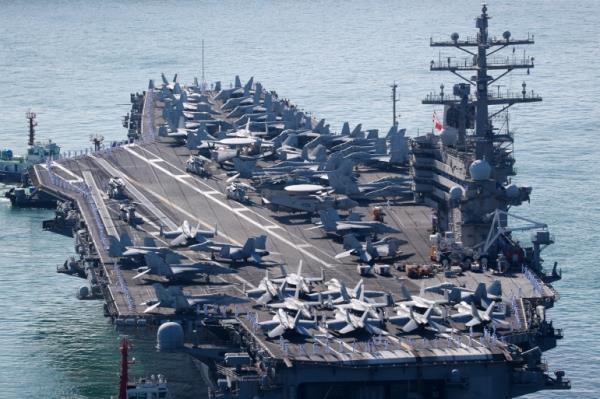 The USS Ronald Reagan approaches a port in Busan, South Korea, on September 23, 2022 