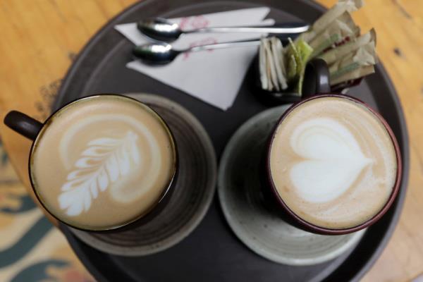 FILE PHOTO: Cups of cappuccino are seen at a store in Bogota