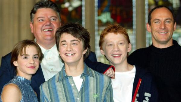 From left: Emma Watson, Robbie Coltrane, Daniel Radcliffe, Rupert Grint and Jason Isaacs in 2002. REUTERS/Stephen Hird SH/ASA

