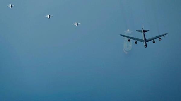 A B-52H Stratofortress from Minot Air Force base in North Dakota flying over an oil tanker in the Middle East Pic: AP
