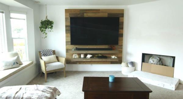 A TV wall blocking a window