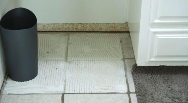 Spot where tiles were ripped up and not replaced
