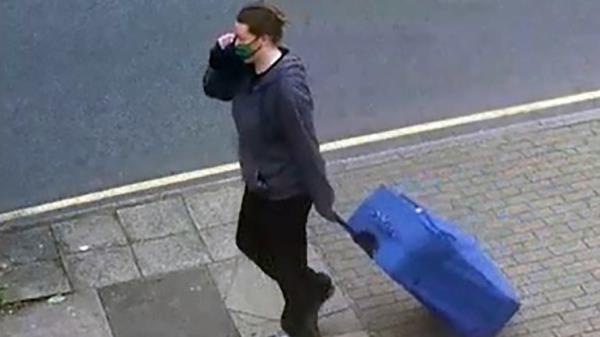 Jemma Mitchell on Chaplin Road, north west London dragging a blue suitcase on 11 June 2021. Pic: Screen grab taken from CCTV issued by Metropolitan Police