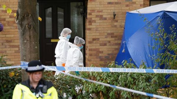Police in forensic suits at the scene in Loxbeare Drive, Furzton, Milton Keynes