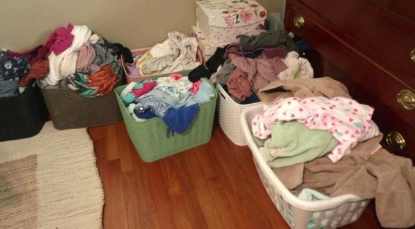 Baskets full of clean laundry littering the parents' bedroom