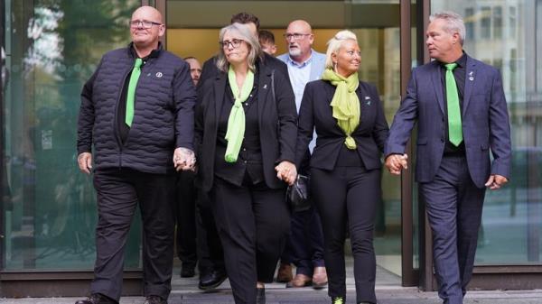 (left to right) The parents of 19-year-old Harry Dunn, Tim Dunn (father) stepmother Tracey Dunn, Charlotte Charles (mother) and stepfather Bruce Charles leave Westminster Magistrates' Court where US citizen Anne Sacoolas, 45, has been granted unconditional bail and the case will next be heard at the Old Bailey on October 27. She is due to face criminal proceedings accused of causing Mr Dunn's death by dangerous driving, when his motorbike crashed into a car outside US military base RAF Croughton