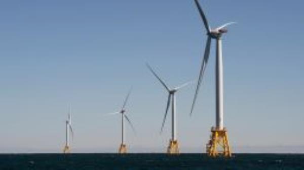 Wind turbines, of the Block Island Wind Farm, tower above the water on October 14, 2016 off the shores of Block Island, Rhode Island. 