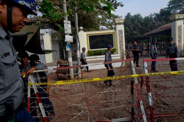 Police barricades outside Insein prison on the outskirts of Yangon, Myanmar, in 2015. Two explosions at the prison on Wednesday are reported to have killed at least eight people, according to media reports 