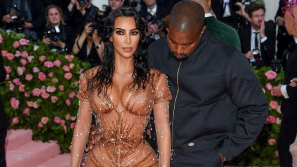 Kim Kardashian West, left, and Kanye West attend The Metropolitan Museum of Art's Costume Institute benefit gala celebrating the opening of the "Camp: Notes on Fashion" exhibition on Monday, May 6, 2019, in New York. (Photo by Evan Agostini/Invision/AP)