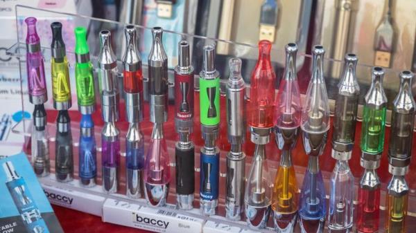 London, UK - 27 February, 2020 - Electronic cigarettes displayed at window of a vape shop