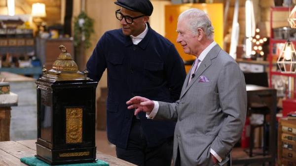 EMBARGOED TO 0001 WEDNESDAY OCTOBER 26 EDITORIAL USE onLY King Charles III, then Prince of Wales with Jay Blades (left) during a special episode of The Repair Shop as part of the BBC's centenary celebrations. Issue date: Wednesday October 26, 2022.