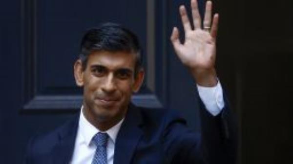 New Conservative Party leader and incoming prime minister Rishi Sunak waves as he departs Conservative Party Headquarters on October 24,2022 in London, England. Rishi Sunak was appointed as Conservative leader and the UK's next Prime Minister after he was the only candidate to garner 100-plus votes from Conservative MPs in the contest for the top job. 