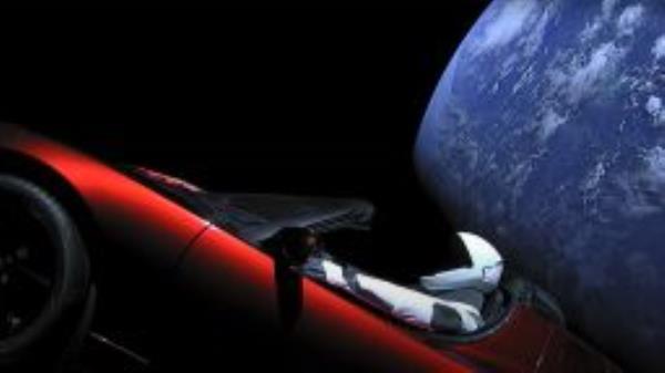 A livestream view of Elon Musk's personal Tesla roadster featuring a mannequin named "Starman" following its launch to space on February 6, 2018.