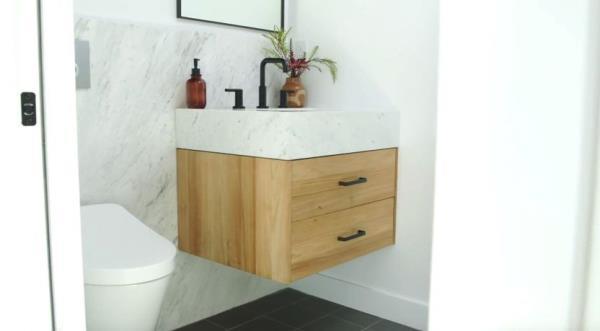 Bathroom with floating sink and toilet