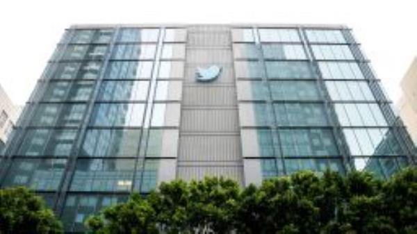 A Twitter logo hangs outside the company's San Francisco offices on Tuesday, Nov. 1, 2022. (AP Photo/Noah Berger)