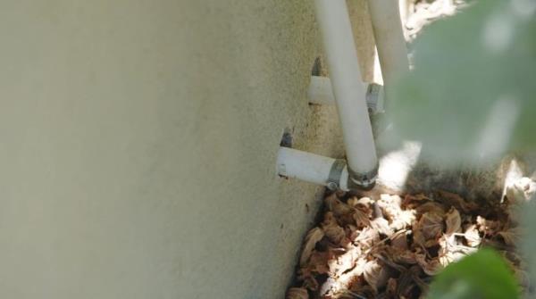 Dreaded plastic pipes running outside