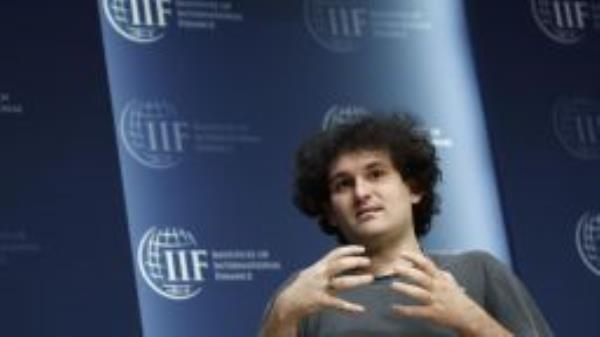 Sam Bankman-Fried, founder and chief executive officer of FTX Cryptocurrency Derivatives Exchange, speaks during the Institute of International Finance (IIF) annual membership meeting in Washington, DC, US, on Thursday, Oct. 13, 2022. This year's conference theme is "The Search for Stability in an Era of Uncertainty, Realignment and Transformation." Photographer: Ting Shen/Bloomberg via Getty Images