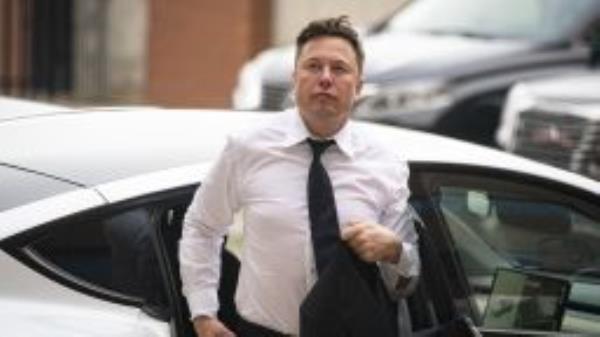Elon Musk, chief executive officer of Tesla Inc., arrives at court during the SolarCity trial in Wilmington, Delaware, U.S., on Tuesday, July 13, 2021. 