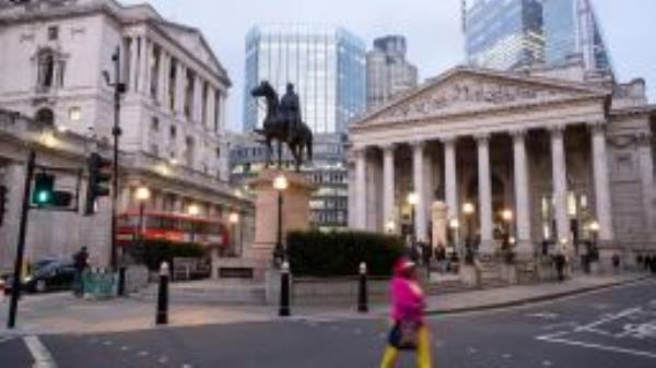 Glass skyscrapers loom over the Bank of England and the Royal Exchange in the City of London as the UK once again slumps into a recession on 14th November 2022 in London, United Kingdom. The City of London is a city, ceremonial county and local government district that contains the primary central business district CBD of London. The City of London is widely referred to simply as the City is also colloquially known as the Square Mile. (photo by Mike Kemp/In Pictures via Getty Images)