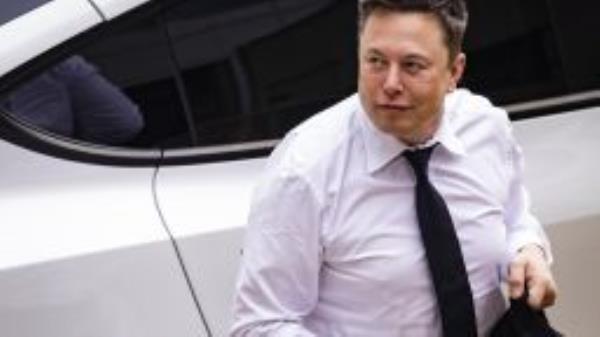 Elon Musk, chief executive officer of Tesla Inc., arrives at court during the SolarCity trial in Wilmington, Delaware, U.S., on Tuesday, July 13, 2021. 