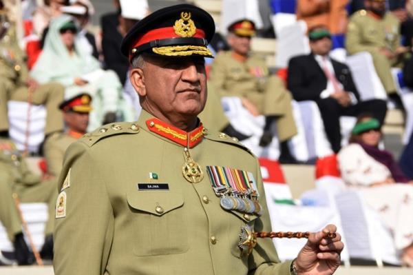 Pakistani Army Chief Gen. Qamar Javed Bajwa attends the Change of Command ceremony in Rawalpindi, Pakistan. Bajwa says he received a phone call from the head of U.S. Central Command, Gen. Joseph Vogel