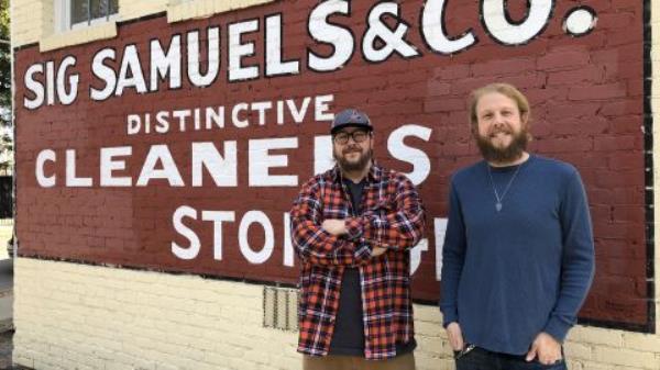 Broy Crosby (left) and Steve Collins (right), owners of Sig Samuels Dry Cleaners in Atlanta, Georgia. 