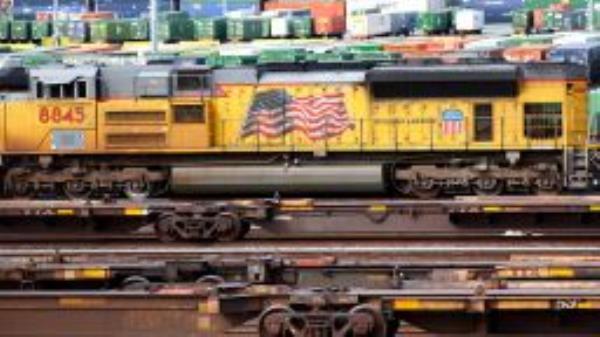 Freight trains and shipping containers are viewed in a Union Pacific Intermodal Terminal rail yard on November 21, 2022 in Los Angeles, California. 