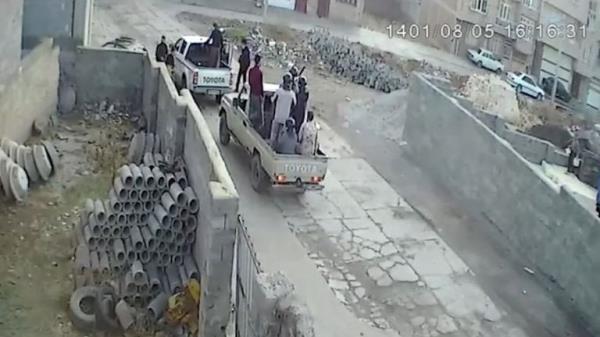 The two trucks in the video are a Toyota Hilux and a Toyota Land Cruiser. The licence plates and other small details are too blurry to make out