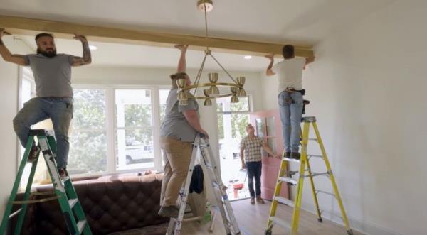 Faux beams being applied