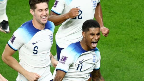 Soccer Football - FIFA World Cup Qatar 2022 - Group B - Wales v England - Ahmad Bin Ali Stadium, Al Rayyan, Qatar - November 29, 2022 England's Marcus Rashford celebrates scoring their first goal REUTERS/Marko Djurica