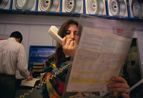 A woman works at a Sears in Hicksville, New York, in 1994.