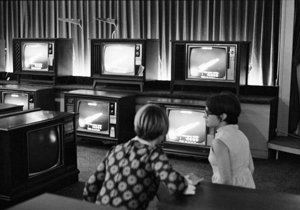 People watch the Apollo 11 rocket launch at a Sears store in White Plains, New York, in 1969.