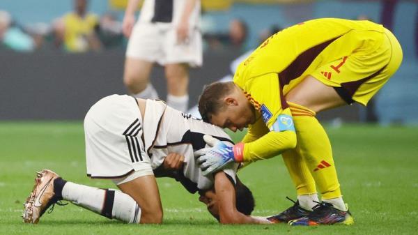 Soccer Football - FIFA World Cup Qatar 2022 - Group E - Costa Rica v Germany - Al Bayt Stadium, Al Khor, Qatar - December 1, 2022 Germany's Manuel Neuer and Jamal Musiala REUTERS/Wolfgang Rattay