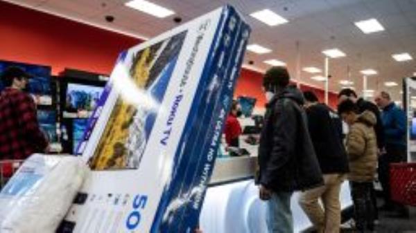 Shoppers in the television section of a Target store on Black Friday in Chicago, Illinois, US, on Friday, Nov. 25, 2022. 