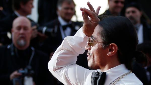 72nd Cannes Film Festival - Screening of the "The Traitor"(Il traditore) in competition - Red Carpet Arrivals - Cannes, France, May 23, 2019. Nusret Gokce known as Salt Bae poses. REUTERS/Stephane Mahe