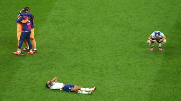 England's Jude Bellingham and Harry Kane dejected following during the FIFA World Cup Quarter-Final match at the Al Bayt Stadium in Al Khor, Qatar. Picture date: Saturday December 10, 2022.