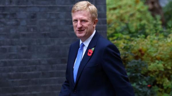 Oliver Dowden walks outside Number 10 Downing Street 
