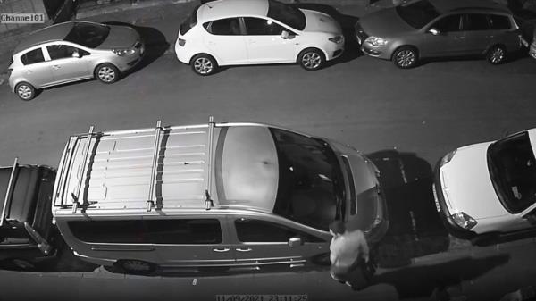 CCTV footage still - one of the men seen carrying audio equipment, jewellery and electronics, which they��d stolen from inside. Pic: Met Police 