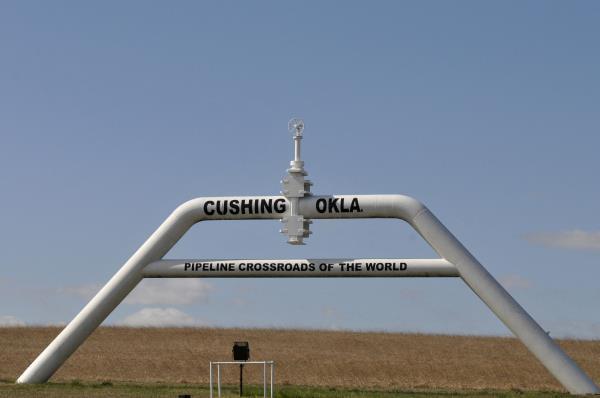 A sign built out of a pipeline that reads 