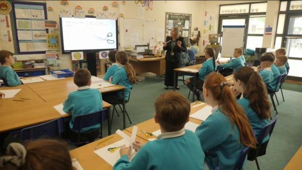 Classroom with teacher and pupils