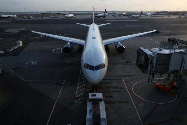 An airplane sits on the tarmac at John F. Kennedy International Airport on the July 4th weekend in Queens, New York City