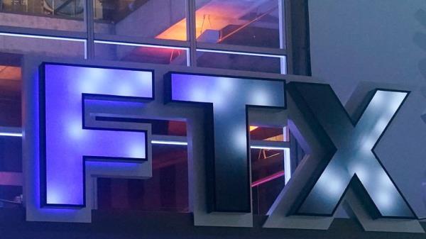 FILE - The FTX Arena logo is seen where the Miami Heat basketball team plays Nov. 12, 2022, in Miami. The former CEO of the failed cryptocurrency exchange FTX said Wednesday, Nov. 30, that he did not ...knowingly" misuse customers' funds, and claimed he believes his millions of angry customers will eventually be made whole. (AP Photo/Marta Lavandier, File)