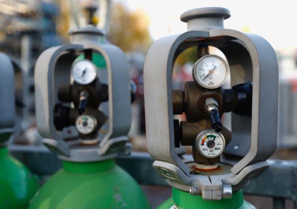 Gas cylinders are stored at at a gas vendor shop in Sint-Pieters-Leeuw