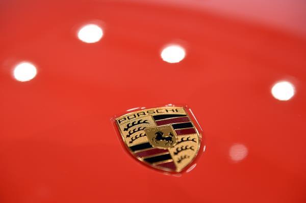 The logo of German carmaker Porsche AG is seen before the company's annual news conference in Stuttgart
