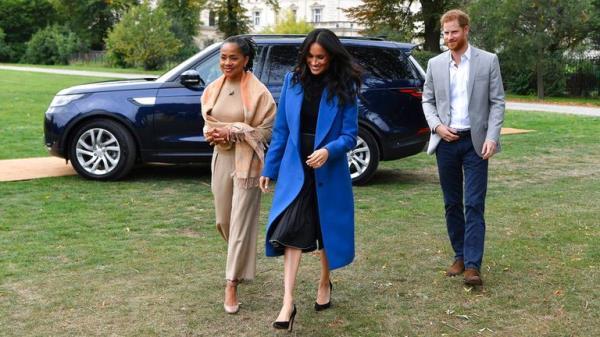 The Sussexes pictured with Meghan's mother, Doria Ragland, at Kensington Palace in 2018 Pic: AP 
