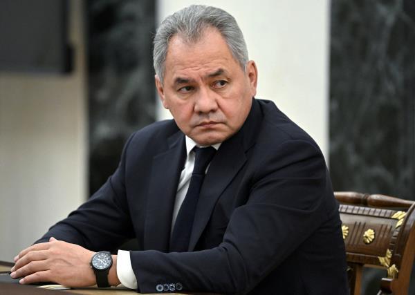 Russian Defence Minister Sergei Shoigu attends a meeting with Russian President Vladimir Putin in Moscow