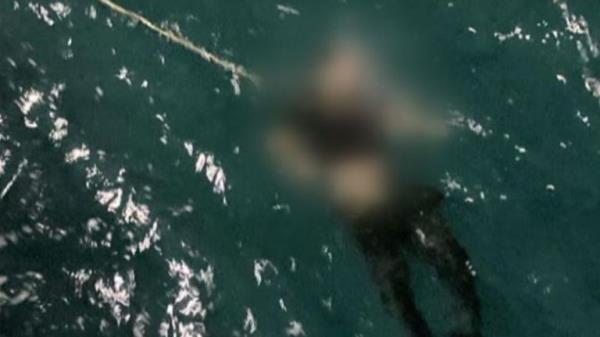 One migrant died while attached to a rope linked to the fisherman's boat