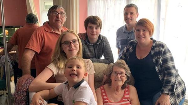 Family photo of Audrey (bottom right) and Lisa (middle right) in 2019