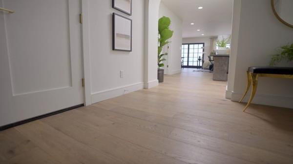 Mid-light toned floors make a place feel more spacious.